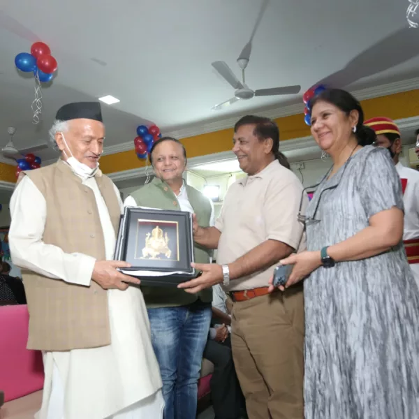 governor with ganpati plaque