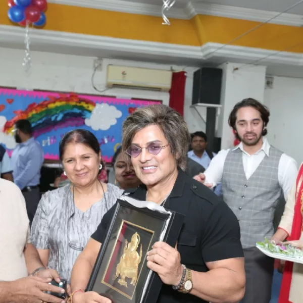 Yash Birla holding ganpati plaque